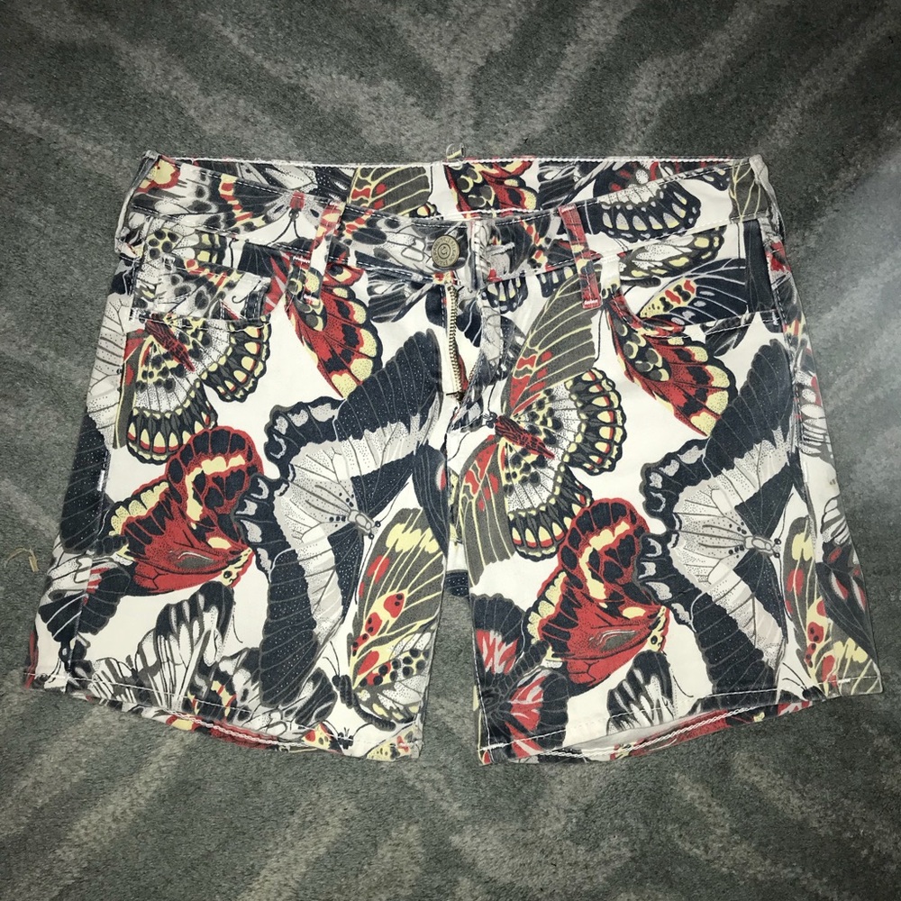 Butterfly True religion mid-thigh shorts.